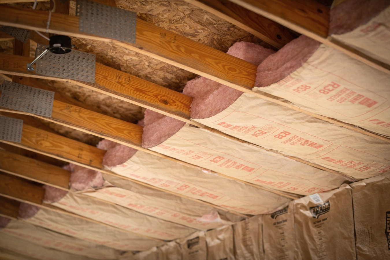 Professional insulation contractor at work in Rochester, MN